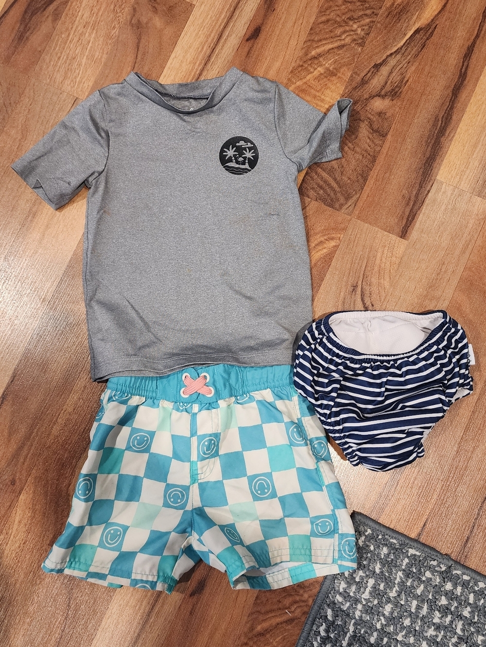 Short Sleeve Rash Guard with Teal Check Swim Shorts And Reusable Swim Diaper
